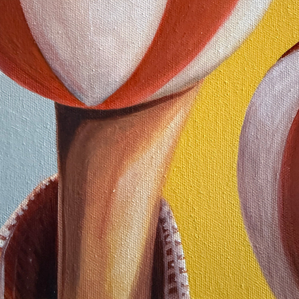 Close-up of a painted abstract composition with curved red, white, and yellow forms on a canvas surface.