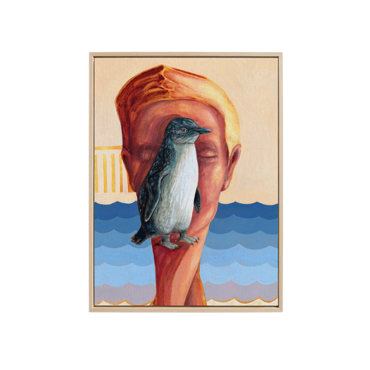 A surreal art print or poster featuring a fairy penguin perched on a large human head, with blue ocean waves at the bottom and a pale beige background, shown against a plain white backdrop.